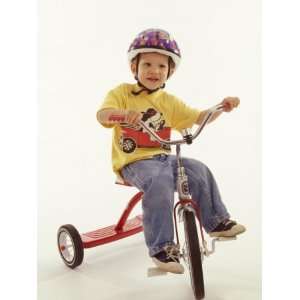 Year Old Boy Posing on His Tricycle, New York, New York, USA 