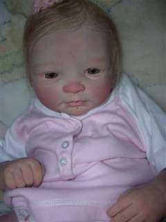   colecctor doll and she needs all the care and love that you can give