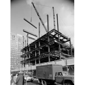 Construction Site For Large Office Building, Cranes Lifting Beams in 