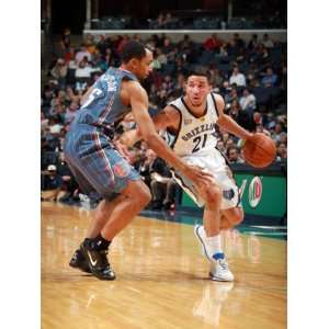 Charlotte Bobcats v Memphis Grizzlies Greivis Vasquez and Gerald 