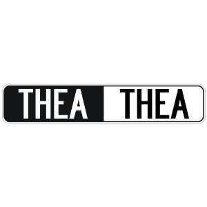   NEGATIVE THEA  STREET SIGN