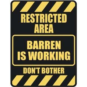   RESTRICTED AREA BARREN IS WORKING  PARKING SIGN