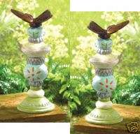 Two (2) garden butterfly totem pole candle holders  