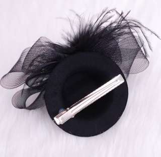  features n mini top hat with black feather tendrils