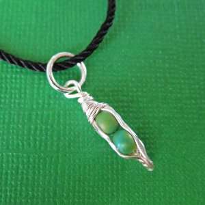   Pod   small handmade pendant   2 matte opal green peas in a silver pod