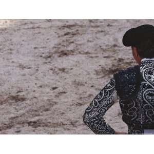  Matador in an Ornate Jacket Stands with His Back to the 