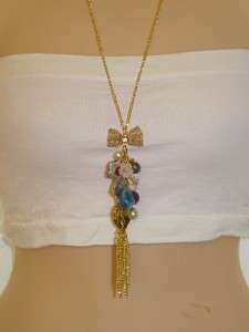 Long Gold Tone WET SEAL Necklace with Charms Bow NEW  