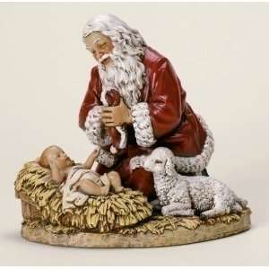    Santa Claus Kneeling By Baby Jesus Figurine