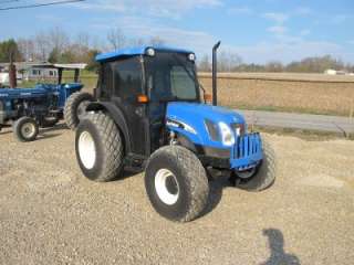 NEW HOLLAND TN75DA 4X4 TRACTOR WITH CAB, 2000 HOURS, TURN AND TILT 