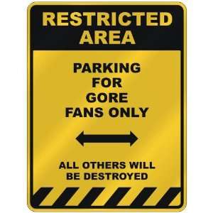  RESTRICTED AREA  PARKING FOR GORE FANS ONLY  PARKING 