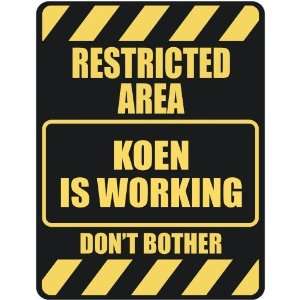   RESTRICTED AREA KOEN IS WORKING  PARKING SIGN