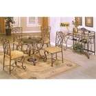   pc metal and glass dining room table set in a burnished gold finish