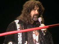 Foley at a TNA house show in Dublin, Ireland in January 2009