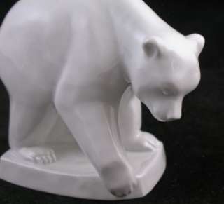   PORCELAIN BEAR FIGURINE WITH WONDERFUL FORM . IN EXCELLENT CONDITION