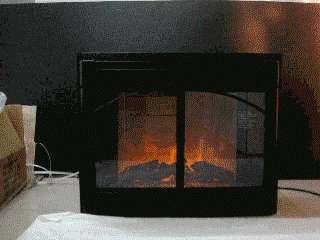 This Is A Brand New  Black Electric Firebox Fireplace Insert 