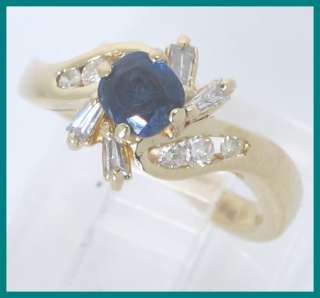   yellow gold sapphire and diamond fashion ring the ring has 1 round cut