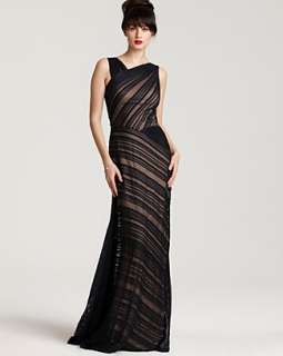   contrast pleating makes a stunning style statement in this asymmetric