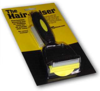 Using the dual function Hair Raiser © grooming and de shedding comb