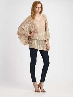 neck pullover Drawstring waist Bat wing sleeves Lined through the 