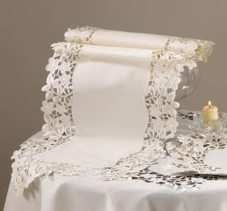 beautiful table runner is done in the vineyard style with embroidered 